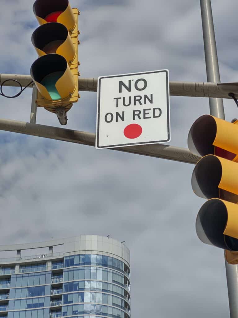 Indianapolis installed no-turn-on-red signs in August in the downtown despite the Indiana General Assembly banning the city from prohibiting right turns on red lights. (Photo/Marilyn Odendahl) 