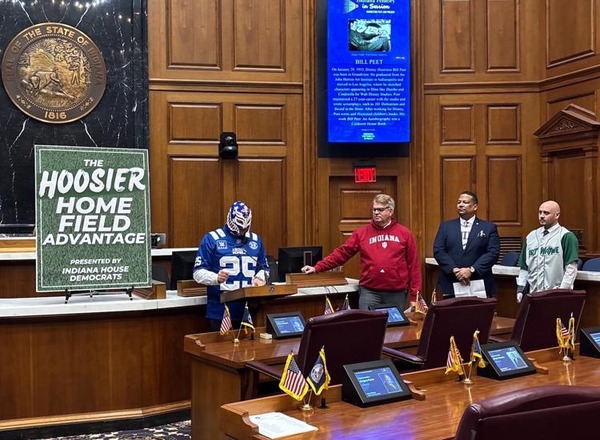 Rep. Mike Andrade, D-Munster, in a lucha libre mask, explains his amendment that aims to promote professional wrestling in Indiana. (Photo/Erin Bruce of TheStatehouseFile.com)