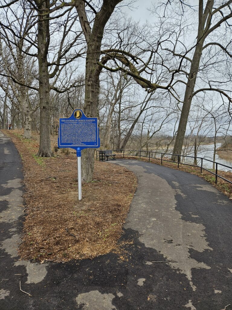 A historical marker acknowledging the March 1922 lynching of George Tompkins now stands at the site of where his body was found in Municipal Gardens in Indianapolis. (Photo/Marilyn Odendahl)