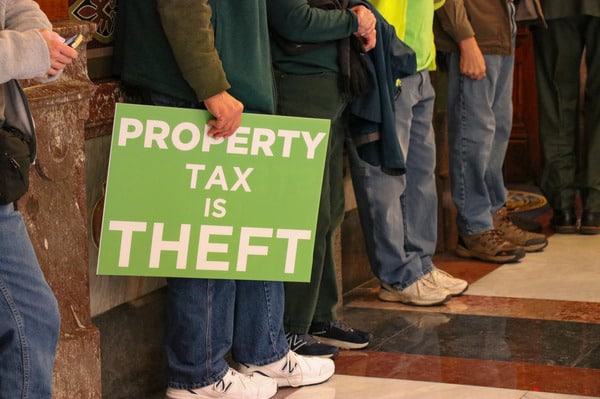 Hundreds of disgruntled Hoosiers gathered at the Statehouse on Monday, demanding lawmakers cut property taxes. (Photo/Juliann Ventura)
