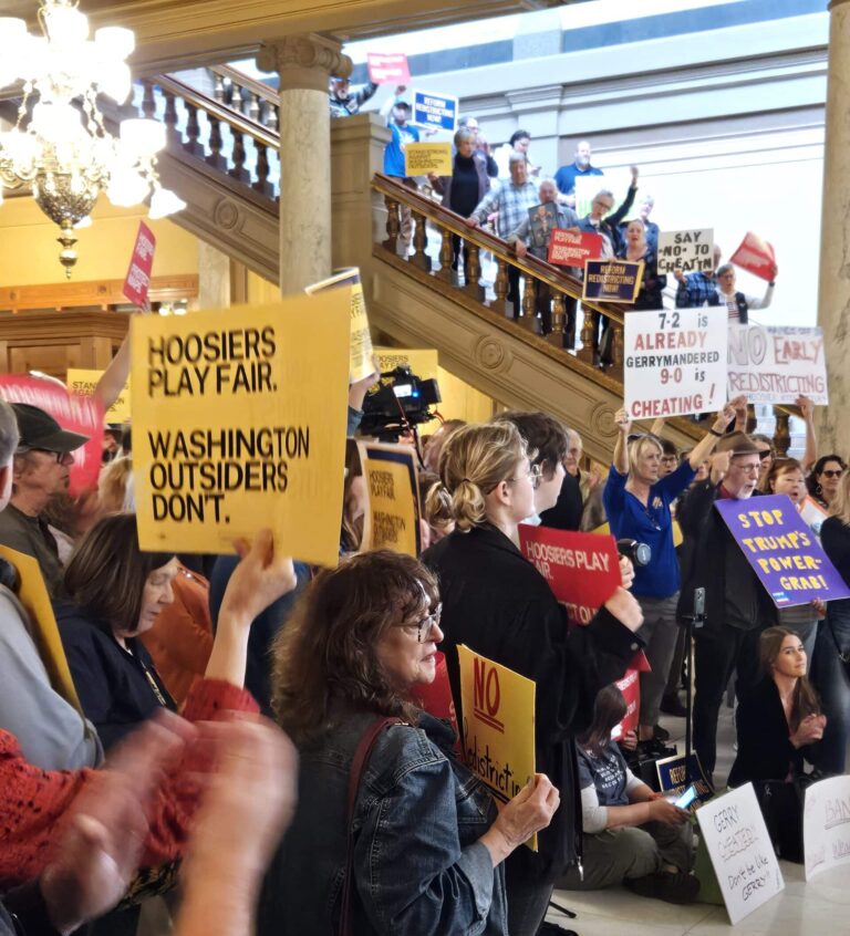 A crowd of protesters cheered and waved signs at a rally on Friday at the Statehouse against mid-decade redistricting. (Photo/Marilyn Odendahl) 
