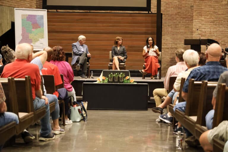 State Democratic Reps. (from left) Ed DeLaney, Carey Hamilton and Victoria Garcia Wilburn encouraged the crowd at a recent town hall in Indianapolis to continue advocating against a mid-decade redistricting. (Photo/courtesy of the Indiana House Democratic Caucus)