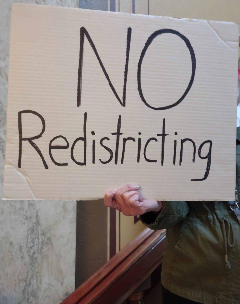 Protesters rallied against mid-decade redistricting at the Statehouse on Oct. 10 when Vice President JD Vance arrived for a second visit with Republican lawmakers. (Photo/Marilyn Odendahl)