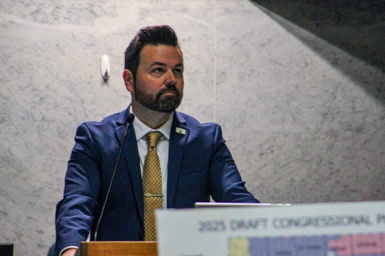 Lt. Gov. Micah Beckwith glared at protesters  who interrupted the Indiana Senate debate on redistricting on Dec. 11. (Photo/Sydney Byerly)