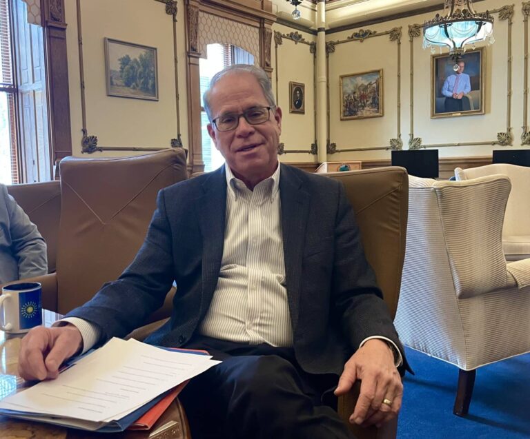 Indiana Gov. Mike Braun talks about his push to root out fraud and cut costs in an interview at his Statehouse office on Tuesday, Feb. 3, 2026. (PhotoLesl/ie Bonilla Muñiz of the Indiana Capital Chronicle)