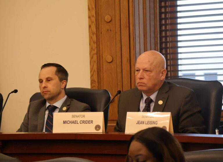 Sen. Michael Crider, R-Greenfield, (left) listens to testimony at the Senate Health and Provider Services Committee for Senate Bill 91, which would allow the state’s needle exchange program to continue. (Photo/Arianna Hunt of TheStatehouseFile.com)