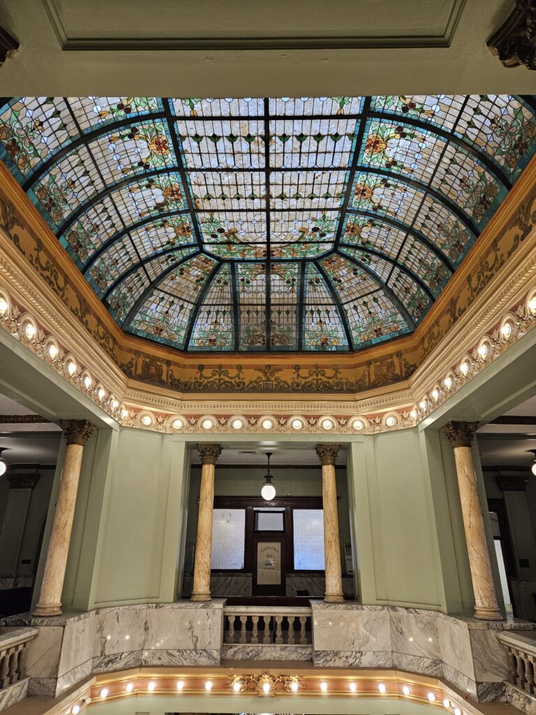 The stained-glass skylight in the central rotunda is the centerpiece of the Clay County Courthouse. (Photo/Marilyn Odendahl)