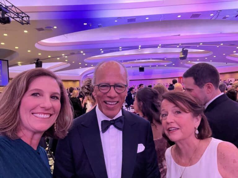 Kathryn Dolan, left, and Indiana Supreme Court Chief Justice Loretta Rush, right, pose with NBC journalist Lester Holt before shots rang out at the White House Correspondents’ Dinner on April 25, 2026, in Washington D.C. (Courtesy photo)